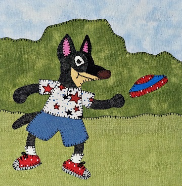 Cattle dog with flying disc applique quilt pattern