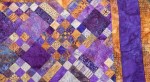 Butterscotch and Purple Quilt by Sharon