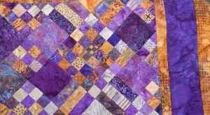 Butterscotch and Purple Quilt by Sharon