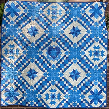 Blue Pieced Quilt by Ryan C