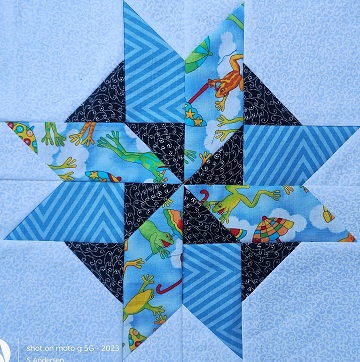 september-pinwheel-star-2-by-sharon-40-ms-p-designs-usa